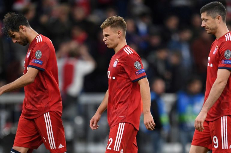 Soccer Football - Champions League - Group Stage - Group E - Bayern Munich v Ajax Amsterdam - Allianz Arena, Munich, Germany - October 2, 2018 Bayern Munich's Javi Martinez, Joshua Kimmich and Robert Lewandowski look dejected after the match REUTERS/Andreas Gebert TPX IMAGES OF THE DAY