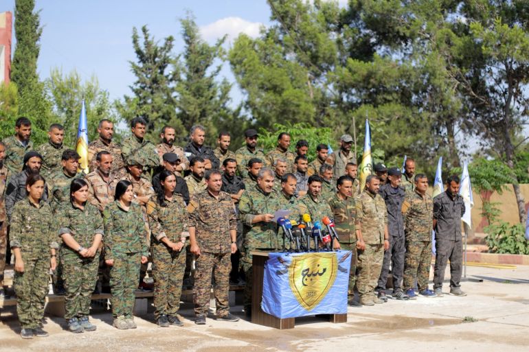 The Manbij Military Council members are seen during a news conference in Manbij, Syria June 6, 2018. REUTERS/Rodi Said