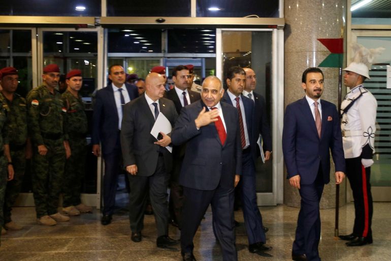 Iraq's Prime Minister-designate Adel Abdul Mahdi and the speaker of Iraq's parliament Mohammed al-Halbousi arrive at the parliament building in Baghdad, Iraq, October 24, 2018. REUTERS/Khalid al Mousily