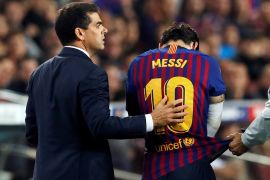 Soccer Football - La Liga Santander - FC Barcelona v Sevilla - Camp Nou, Barcelona, Spain - October 20, 2018 Barcelona's Lionel Messi receives medical attention after sustaining an injury REUTERS/Albert Gea