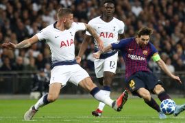 LONDON, ENGLAND - OCTOBER 03: Lionel Messi of Barcelona shoots under pressure from Toby Alderweireld of Tottenham Hotspur during the Group B match of the UEFA Champions League between Tottenham Hotspur and FC Barcelona at Wembley Stadium on October 3, 2018 in London, United Kingdom. (Photo by Julian Finney/Getty Images)