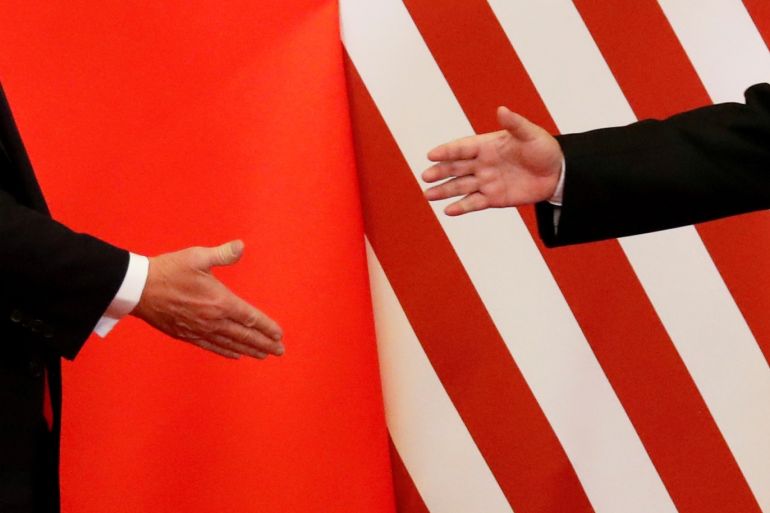 U.S. President Donald Trump and China's President Xi Jinping shake hands after making joint statements at the Great Hall of the People in Beijing, China, November 9, 2017. Damir Sagolj: