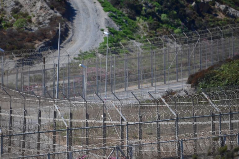 CEUTA, SPAIN - AUGUST 23: General view of the border fence separating the Spanish exclave of Ceuta from Morocco on August 23, 2018 in Ceuta, Spain. Many migrants are seeking to reach Europe through Ceuta and a second Spanish exclave, Melilla, as the migrant route has shifted towards the western Mediterranean and away from the Balkans. Yesterday morning 150 African migrants jumped the fence from Morocco. (Photo by Alexander Koerner/Getty Images)