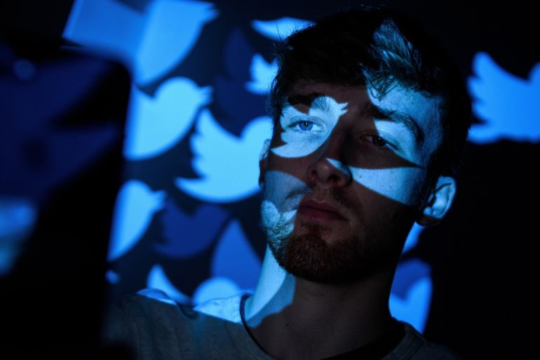 LONDON, ENGLAND - AUGUST 09: In this photo illustration, the logo for the Twitter social media network is projected onto a man on August 09, 2017 in London, England. With around 328 million users worldwide, Twitter has gone from a small start-up in for the public 2006 to a broadcast tool of politicians and corporations in 2017. (Photo by Leon Neal/Getty Images)