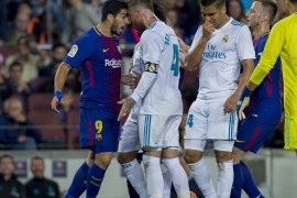 Barcelona v Real Madrid: La Liga - - BARCELONA, SPAIN - MAY 6: Fc Barcelona's Uruguayan forward Luis Suarez reacts against Real Madrid's spanish defender Sergio Ramos next to Casemiro and Marcelo during the Spanish league football match between FC Barcelona and Real Madrid CF at the Camp Nou stadium in Barcelona on May 6, 2018