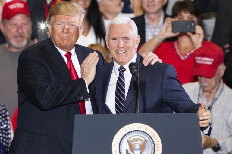 PENSACOLA, FL - NOVEMBER 03: U.S. President Donald Trump and Vice President Mike Pence at a campaign rally at the Pensacola International Airport on November 3, 2018 in Pensacola, Florida. President Trump is campaigning in support of Republican candidates in the upcoming midterm elections. Mark Wallheiser/Getty Images/AFP== FOR NEWSPAPERS, INTERNET, TELCOS &amp; TELEVISION USE ONLY ==