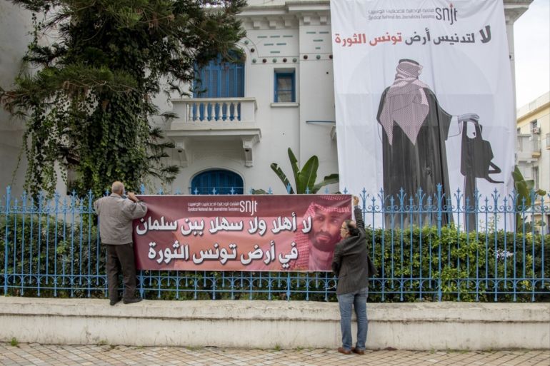 Reactions of Saudi Prince Mohammad's visit in Tunisia- - TUNIS, TUNISIA - NOVEMBER 26: Banners are hanged on the National Union of Tunisian Journalists building to protest Crown Prince and Defense Minister of Saudi Arabia Mohammad bin Salman al-Saud due to the killing of Saudi journalist Jamal Khashoggi ahead of his visit in Tunis, Tunisia on November 26, 2018.