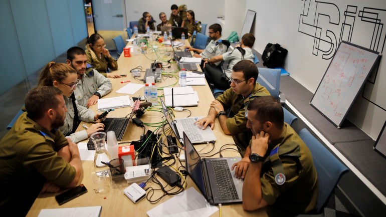 Israeli soldiers work on laptops as they take part in a cyber security training course, called a Hackathon, at iNT Institute of Technology and Innovation, at a high-tech park in Beersheba, southern Israel August 28, 2017. Picture taken August 28, 2017. REUTERS/Amir Cohen