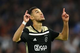 AMSTERDAM, NETHERLANDS - OCTOBER 23: Noussair Mazraoui of Ajax celebrates after scoring his team's first goal during the Group E match of the UEFA Champions League between Ajax and SL Benfica at Johan Cruyff Arena on October 23, 2018 in Amsterdam, Netherlands. (Photo by Dean Mouhtaropoulos/Getty Images)
