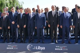 Heads of delegations pose for a family photo during the second day of the international conference on Libya in Palermo, Italy, November 13, 2018. Sputnik/Alexander Astafyev/Handout via REUTERS ATTENTION EDITORS - THIS IMAGE WAS PROVIDED BY A THIRD PARTY.