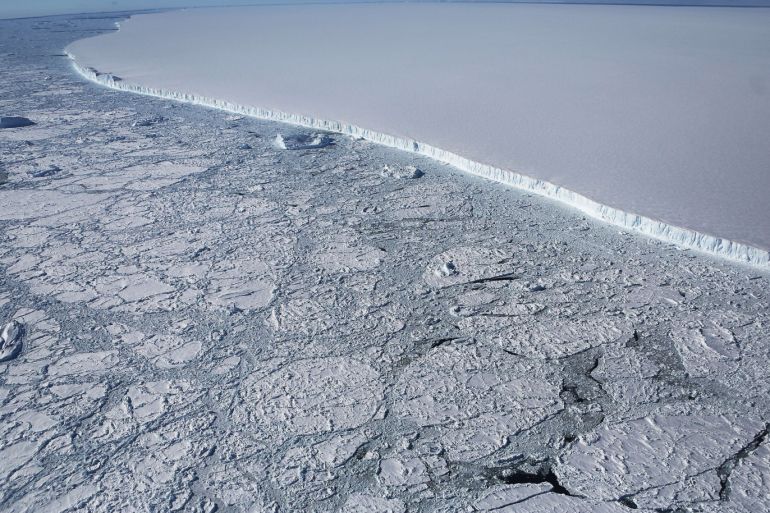 UNSPECIFIED, ANTARCTICA - OCTOBER 31: (One of a 115-image Best of Year 2017 set) The western edge of the famed iceberg A-68 (TOP R), calved from the Larsen C ice shelf, is seen from NASA's Operation IceBridge research aircraft, near the coast of the Antarctic Peninsula region, on October 31, 2017, above Antarctica. The massive iceberg was measured at approximately the size of Delaware when it first calved in July. NASA's Operation IceBridge has been studying how polar