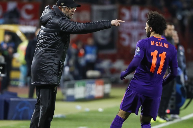 BELGRADE, SERBIA - NOVEMBER 06: Manager Jurgen Klopp (L) of Liverpool speaks with Mohamed Salah (R) during the Group C match of the UEFA Champions League between Red Star Belgrade and Liverpool at Rajko Mitic Stadium on November 06, 2018 in Belgrade, Serbia. (Photo by Srdjan Stevanovic/Getty Images)