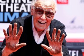 Marvel Comics co-creator Stan Lee shows his hands after placing them in cement during a ceremony in the forecourt of the TCL Chinese theatre in Los Angeles, California, U.S., July 18, 2017. REUTERS/Mario Anzuoni