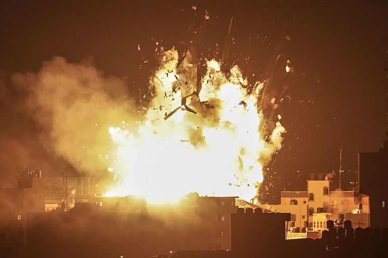 epa07161363 Smoke rises from the building of Al-Aqsa channel belonging to Hamas movement after Israeli air strike in Gaza City, 12 November 2018. Quider and six fighters were killed after Israeli air strikes in the east of Khan Younis town southern Gaza Strip a night earlier. EPA-EFE/MOHAMMED SABER