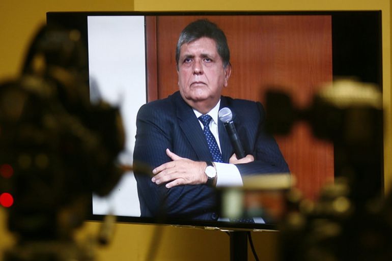 epa04815992 Former Peruvian president Alan Garcia is seen on a monitor during a hearing in Lima, Peru, on 23 June 2015. Garcia appeared in court to testify as witness in the process of the alleged corruption case known as "Petroaudios", during his second term in office (2006-2011), in which is accused Dominican businessman Fortunato Canaan. Garcia admitted that he met twice in 2007 with Canaan, who was a representative of the Norwegian company Discover Petroleum, which is accused of having received oil concessions illegally. EPA/STR