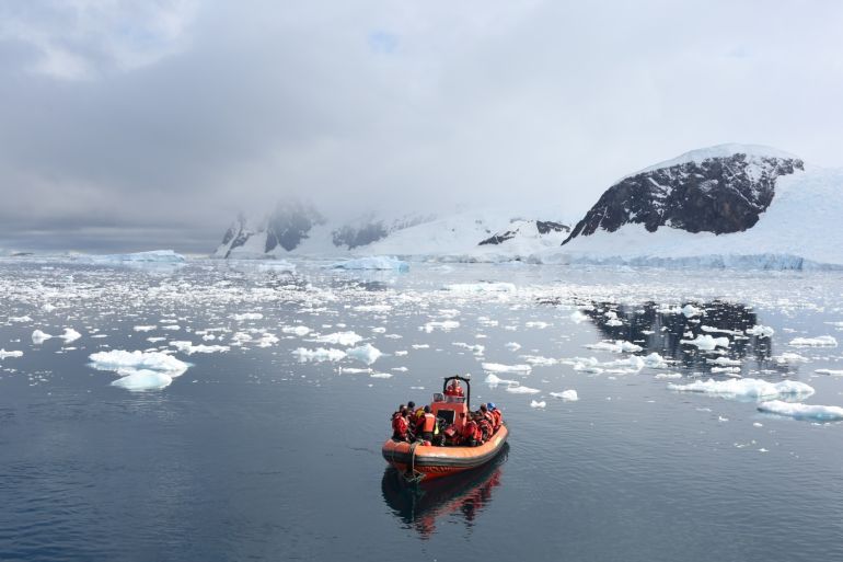 A Greenpeace boat floats in Neko Harbour, Antarctica, February 16, 2018. REUTERS/Alexandre Meneghini
