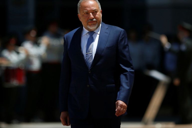 Israel's new Defence Minister, Avigdor Lieberman, head of far-right Yisrael Beitenu party, reviews an honour guard during a welcoming ceremony at the Defence Ministry in Tel Aviv, Israel May 31, 2016. REUTERS/Ronen Zvulun