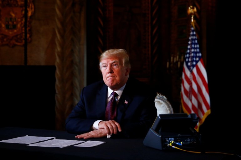 U.S. President Donald Trump takes questions from the media after speaking via teleconference with troops from Mar-a-Lago estate in Palm Beach, Florida, U.S., November 22, 2018. REUTERS/Eric Thayer