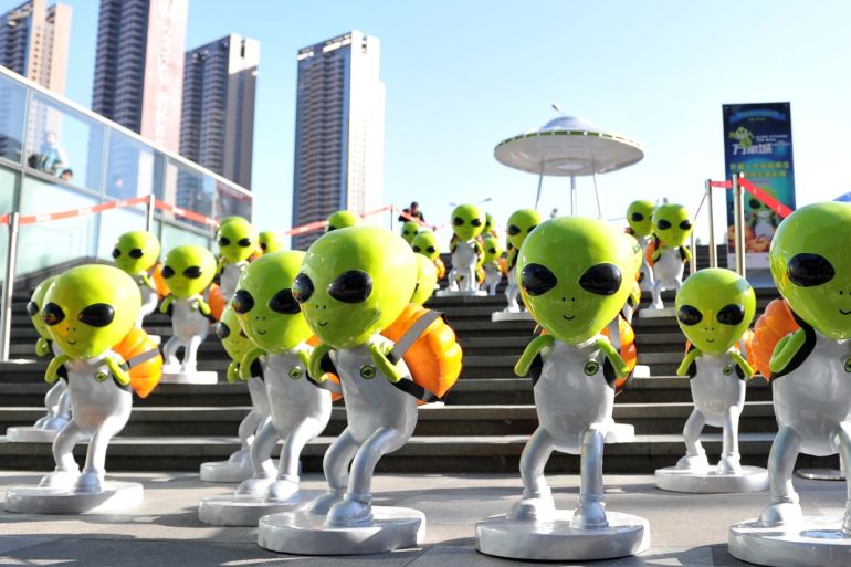SHENYANG, CHINA - OCTOBER 27: (CHINA OUT) Small 'aliens' sculptures 'fall' in front of a shopping mall to welcome the upcoming Halloween Day on October 27, 2015 in Shenyang, Liaoning Province of China. The Halloween day will fall on Friday this year. (Photo by VCG/VCG via Getty Images)