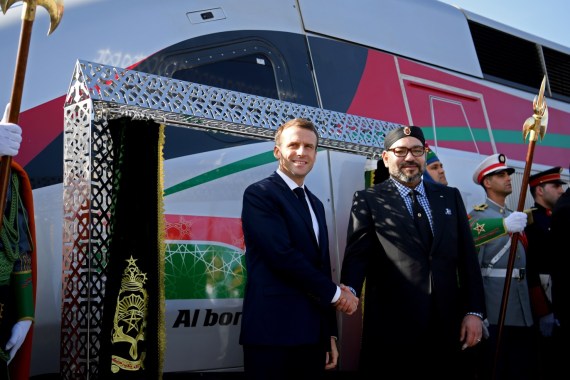 French President Emmanuel Macron and Moroccan King Mohammed VI pose for a photograph as they inaugurate a high-speed line at Tangier train station, in Tangier, Morocco November 15, 2018. Christophe Archambault/Pool via Reuters