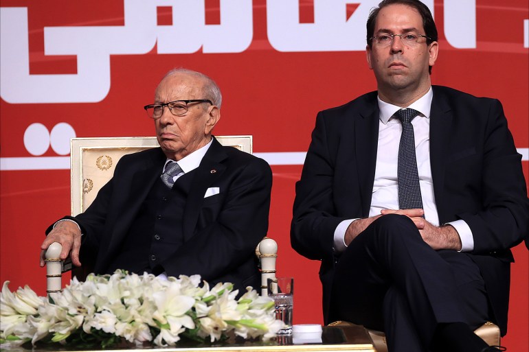 May Day celebrations in Tunisia - - TUNIS, TUNISIA - MAY 01: Tunisian President, Beji Caid el Sebsi (L), Tunisian Prime Minister Youssef Chahed (C) and Secretary-General, participate in the event to mark the May Day, International Workers' Day in Tunis, Tunisia on May 01, 2018.