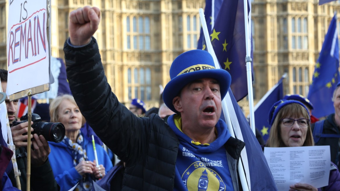 Protests outside of Westminster Palace as Brexit vote postponed- - LONDON, UNITED KINDOM - DECEMBER 11: Pro-brexit and pro-remain  protesters demonstrate outside UK parliament in London, United Kingdom on December 11, 2018.  After British Prime Minister Theresa May postponed a House of Commons vote on the Brexit deal she is in a one day your of Europe meeting with European counterparts and EU officials today hoping to get some new concessions.