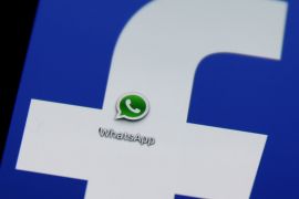 A Whatsapp icon is seen on a Samsung Galaxy S4 phone screen with a Facebook logo in the central Bosnian town of Zenica, February 20, 2014. Facebook Inc will buy fast-growing mobile-messaging startup WhatsApp for $19 billion in cash and stock in a landmark deal that places the world's largest social network closer to the heart of mobile communications and may bring younger users into the fold. REUTERS/Dado Ruvic (BOSNIA AND HERZEGOVINA - Tags: BUSINESS)