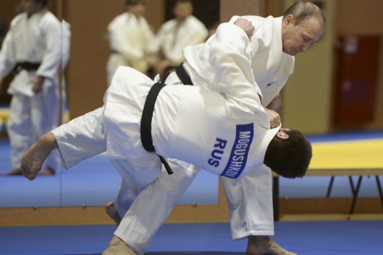 Russia's President Vladimir Putin practises with Musa Mogushkov of the Russian national judo team during a training session in Sochi, Russia, January 8, 2016. REUTERS/Alexey Nikolsky/Sputnik/Kremlin ATTENTION EDITORS - THIS IMAGE HAS BEEN SUPPLIED BY A THIRD PARTY. IT IS DISTRIBUTED, EXACTLY AS RECEIVED BY REUTERS, AS A SERVICE TO CLIENTS.