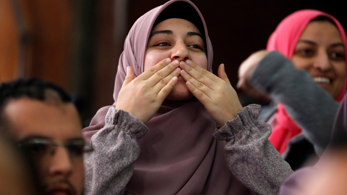 Relatives of Muslim Brotherhood members gesture during a court session in Cairo, Egypt, December 26, 2018. REUTERS/Amr Abdallah Dalsh