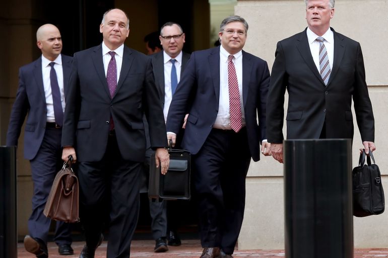 ALEXANDRIA, VA - AUGUST 15: Kevin Downing (R), attorney of former Trump campaign chairman Paul Manafort, and members of the defense team depart the Albert V. Bryan United States Courthouse August 15, 2018 in Alexandria, Virginia. Manafort has been charged with bank and tax fraud as part of special counsel Robert Mueller's investigation into Russian interference in the 2016 presidential election. The defense team and prosecution both finished their closing arguments tod