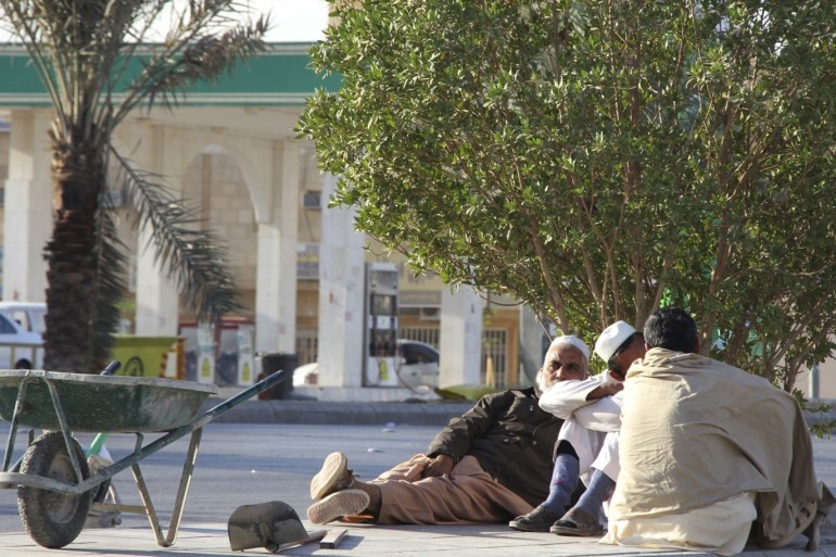 Foreign labourers rest near a construction site in Riyadh, November 23, 2011. Saudi Arabia's suggestion last month that it will try to limit how much money expatriate workers send home showed concern about the cost of having foreigners make up nearly a third of the population. An estimated 9 million foreign workers and their dependents remitted 26.8 billion riyals ($7.1 billion) out of the country in the second quarter of this year, central bank data shows. To match Analysis SAUDI-REMITTANCES/ REUTERS/Abdullah Shadeed (SAUDI ARABIA - Tags: SOCIETY IMMIGRATION BUSINESS EMPLOYMENT)