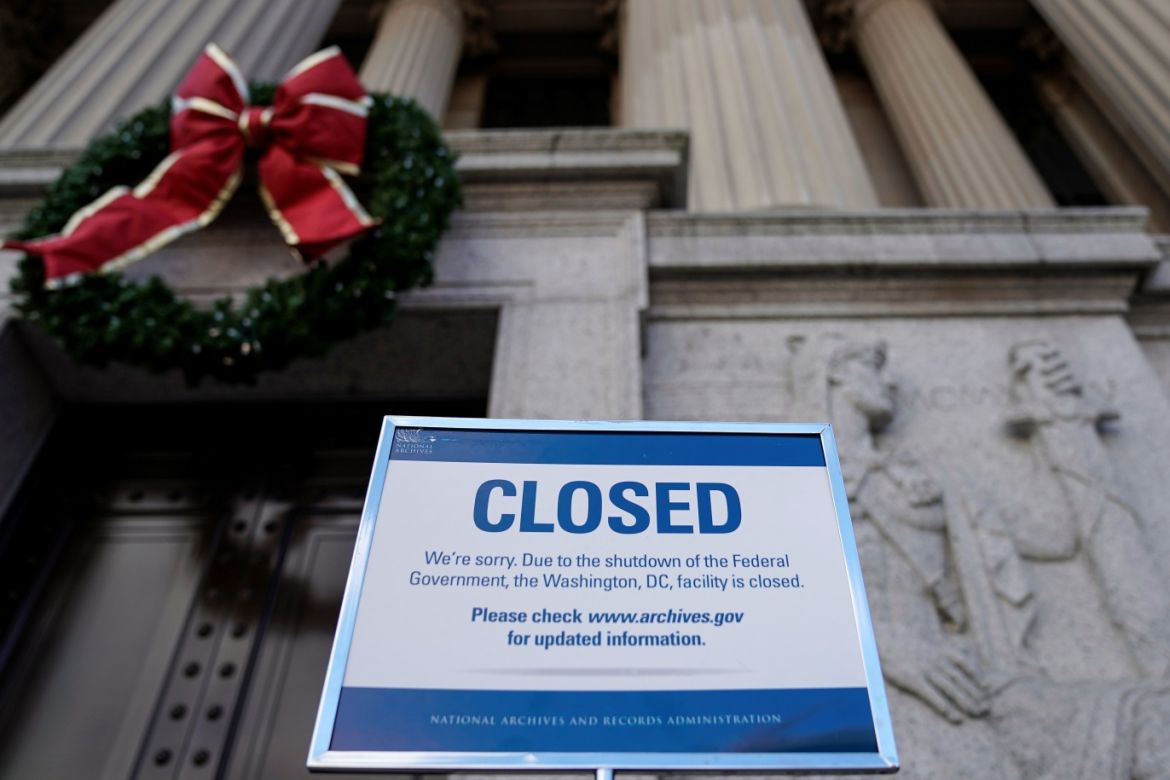 A sign declares the National Archive is closed due to a partial federal government shutdown in Washington, U.S., December 22, 2018. REUTERS/Joshua Roberts