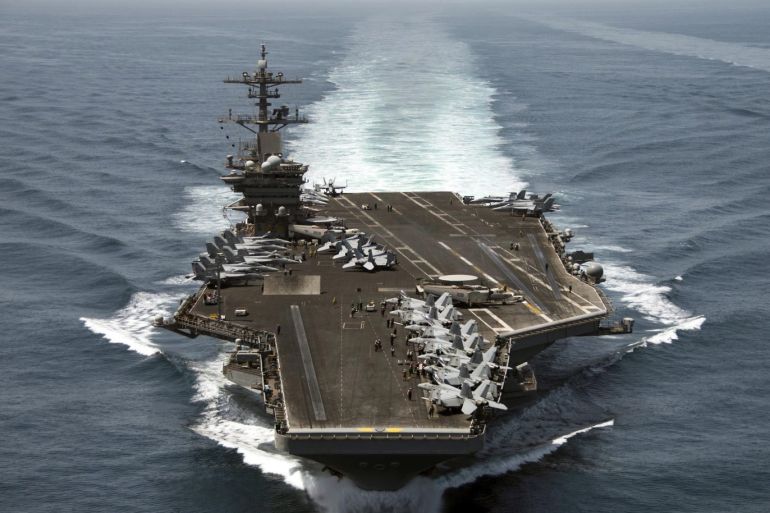 The aircraft carrier USS Theodore Roosevelt (CVN 71) operates in the Arabian Sea conducting maritime security operations in this U.S. Navy photo taken April 21, 2015. The Roosevelt and its escort ship the guided-missile cruiser USS Normandy (CG 60) will join seven other U.S. warships in the waters near Yemen, which is torn by civil strife as Iranian-backed Houthi rebels battle forces loyal to the U.S.-backed president. REUTERS/U.S. Navy/Mass Communication Specialist 3rd Class Anthony N. Hilkowski/Handout THIS IMAGE HAS BEEN SUPPLIED BY A THIRD PARTY. IT IS DISTRIBUTED, EXACTLY AS RECEIVED BY REUTERS, AS A SERVICE TO CLIENTS. FOR EDITORIAL USE ONLY. NOT FOR SALE FOR MARKETING OR ADVERTISING CAMPAIGNS