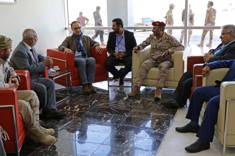 Retired Dutch General Patrick Cammaert, who heads a United Nations advance team tasked with monitoring a ceasefire between the Iranian-aligned Houthi group and Saudi-backed government forces in Yemen's Hodeidah, meets Yemeni officials upon his arrival at Aden airport December 22, 2018. REUTERS/Fawaz Salman