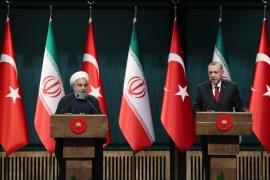 Turkey-Iran High-Level Cooperation Council Meeting- - ANKARA, TURKEY - DECEMBER 20: President of Turkey, Recep Tayyip Erdogan (R) and President of Iran, Hassan Rouhani (L) hold a joint press conference after the Turkey-Iran High-Level Cooperation Council Meeting at Presidential Complex in Ankara, Turkey on December 20, 2018.