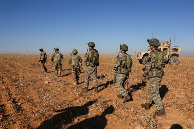 U.S. and Turkish soldiers conduct the first-ever combined joint patrol outside Manbij, Syria, November 1, 2018. Picture taken November 1, 2018. Courtesy Arnada Jones/U.S. Army/Handout via REUTERS ATTENTION EDITORS - THIS IMAGE HAS BEEN SUPPLIED BY A THIRD PARTY.