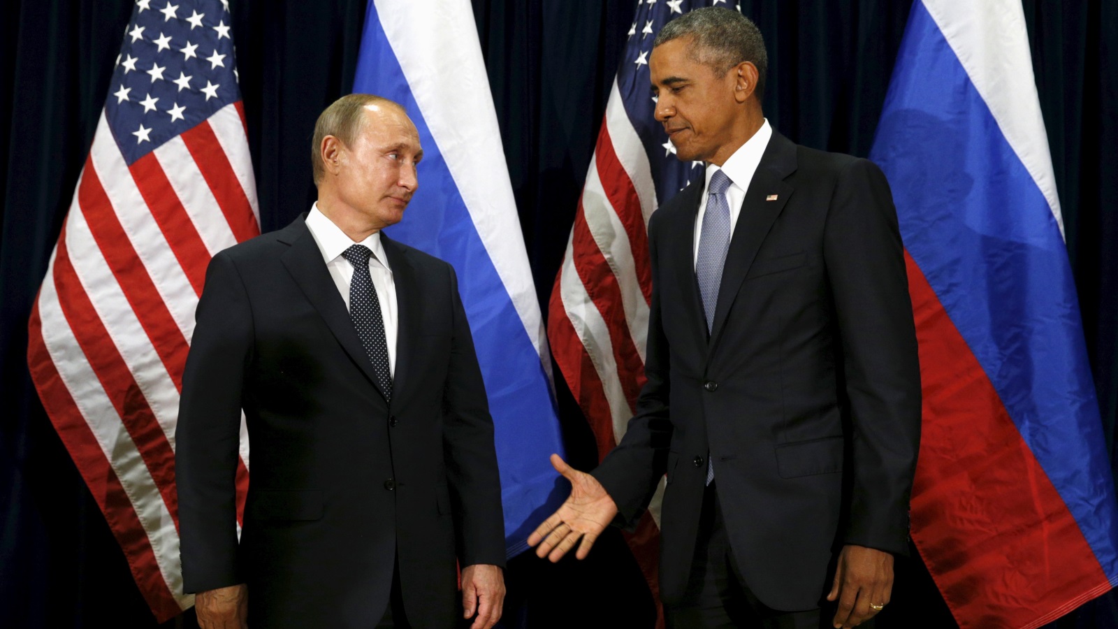 الرئيس الروسي بوتين مع الرئيس الأميركي السابق أوباما (رويترز)