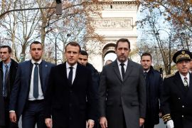 France's President Emmanuel Macron, France's Interior Minister Christophe Castaner and Paris police Prefect Michel Delpuech arrive to visit firefighters and riot police officers the day after a demonstration, in Paris, France December 2, 2018. Thibault Camus/Pool via REUTERS