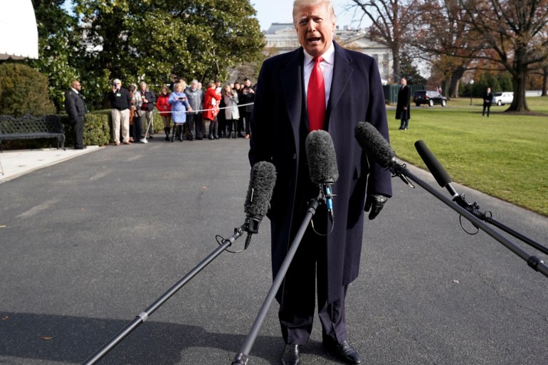 U.S. President Donald Trump talks to the media on the South Lawn of the White House in Washington before his departure for the annual Army-Navy college football game in Philadelphia, U.S., December 8, 2018. REUTERS/Yuri Gripas