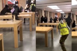 People break into an Apple store in Bordeaux, France, December 8, 2018 in this still image taken from a social media video. OBTAINED BY REUTERS ATTENTION EDITORS - THIS IMAGE HAS BEEN SUPPLIED BY A THIRD PARTY. MANDATORY CREDIT.