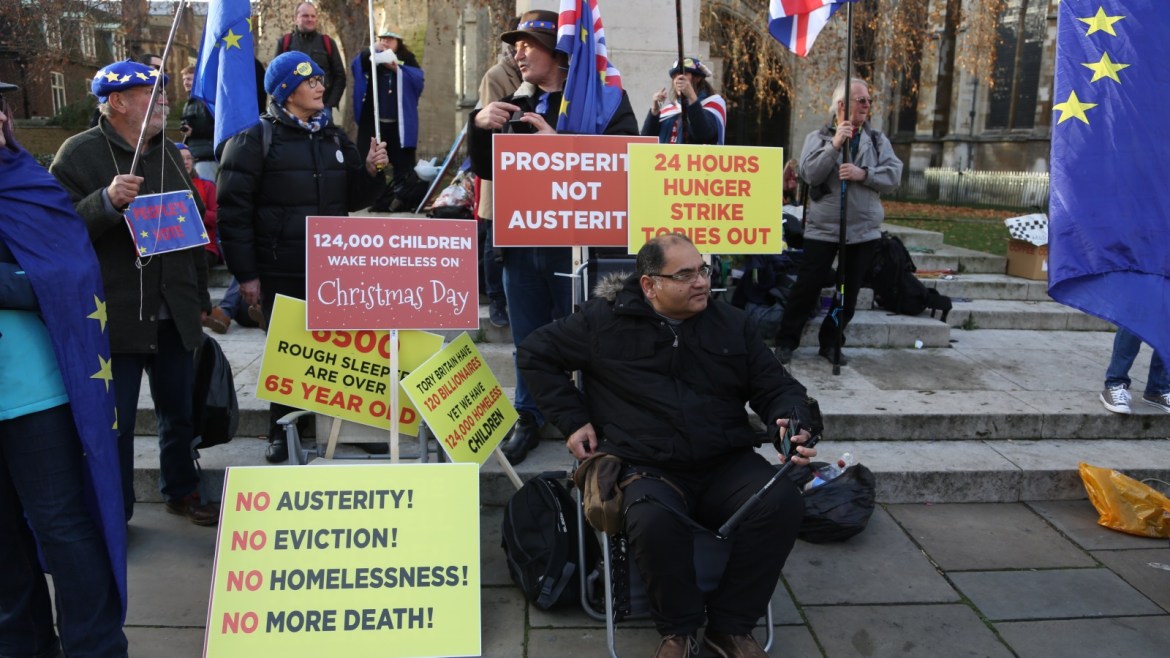 Protests outside of Westminster Palace as Brexit vote postponed- - LONDON, UNITED KINDOM - DECEMBER 11: Pro-brexit and pro-remain  protesters demonstrate outside UK parliament in London, United Kingdom on December 11, 2018.  After British Prime Minister Theresa May postponed a House of Commons vote on the Brexit deal she is in a one day your of Europe meeting with European counterparts and EU officials today hoping to get some new concessions.