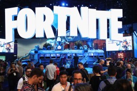 LOS ANGELES, CA - JUNE 12: Game enthusiasts and industry personnel visit the 'Fortnite' exhibit during the Electronic Entertainment Expo E3 at the Los Angeles Convention Center on June 12, 2018 in Los Angeles, California. Christian Petersen/Getty Images/AFP== FOR NEWSPAPERS, INTERNET, TELCOS & TELEVISION USE ONLY ==