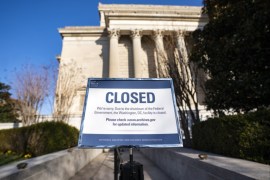 epa07249305 A sign alerts visitors to the closure of the National Archives on the fifth day of a partial government shutdown in Washington, DC, USA, 26 December 2018. Last week, President Trump rejected a Senate-passed continuing resolution to fund the federal government because it did not include money for his border wall. Though President Trump said he was 'proud' to shut the government down, lawmakers will meet again later this week to attempt to negotiate a way ar