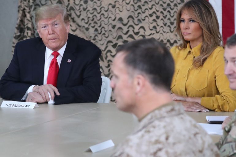 U.S. President Donald Trump, traveling with first lady Melania Trump, meets political and military leaders and makes a policy speech to U.S. troops in an unannounced visit to Al Asad Air Base, Iraq December 26, 2018. REUTERS/Jonathan Ernst