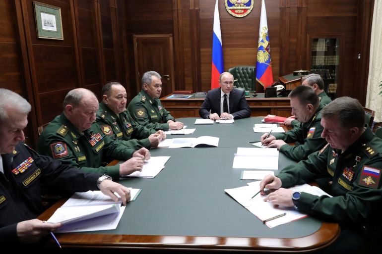 Russia's President Vladimir Putin (C) meets with the commanders of Russian military districts and the Northern Fleet as part of a session of the Defence Ministry Board in Moscow, Russia December 18, 2018. Sputnik/Mikhail Klimentyev/Kremlin via REUTERS ATTENTION EDITORS - THIS IMAGE WAS PROVIDED BY A THIRD PARTY.