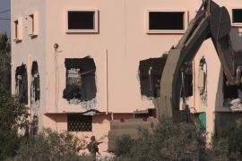 Israeli army razes home of alleged Palestinian shooter- - TULKARM, WEST BANK - DECEMBER 17: Israeli forces demolish the home of a Palestinian youth Ashraf Naalwa accused of killing two settlers in an attack in the West Bank in October, in the town of Shweika in the city Tulkarm, West Bank on December 17, 2018.