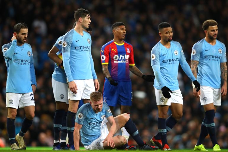 MANCHESTER, ENGLAND - DECEMBER 22: Kevin De Bruyne of Manchester City goes down injured during the Premier League match between Manchester City and Crystal Palace at Etihad Stadium on December 22, 2018 in Manchester, United Kingdom. (Photo by Clive Brunskill/Getty Images)