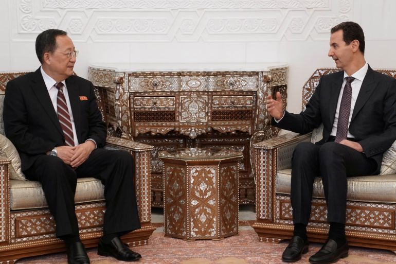Syrian President Bashar al-Assad gestures as he talks with North Korea's Foreign minister Ri Yong Ho in Damascus, Syria December 4, 2018. SANA/Handout via REUTERS ATTENTION EDITORS - THIS IMAGE WAS PROVIDED BY A THIRD PARTY. REUTERS IS UNABLE TO INDEPENDENTLY VERIFY THIS IMAGE