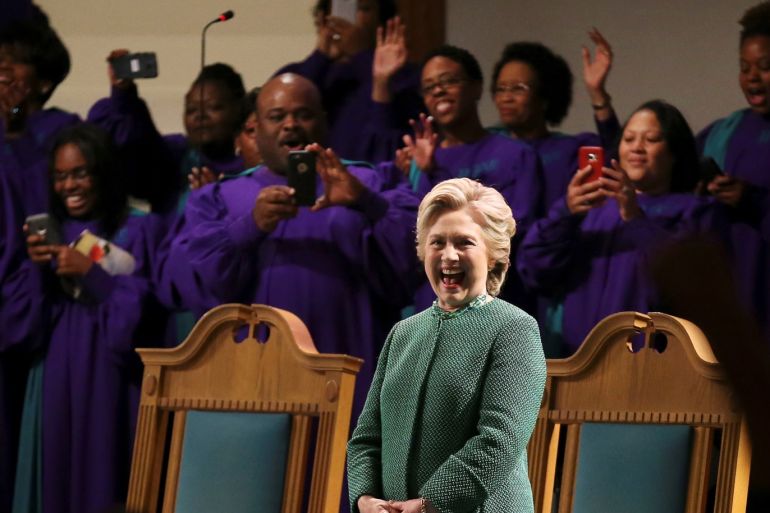 U.S. Democratic presidential nominee Hillary Clinton reacts as she arrives to attend a Sunday service at Union Baptist Church accompanied by