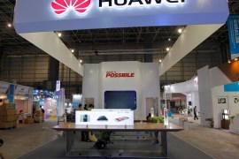 Workers prepare the stand for Huawei at the venue of the 21st Century Maritime Silk Road International Expo in Dongguan, Guangdong province, China, October 28, 2015. China's Huawei Technologies Co is set to be the fastest-growing major smartphone vendor this year, analysts said, boosting its drive upmarket to challenge industry giants Samsung Electronics Co and Apple Inc. Picture taken October 28, 2015. REUTERS/Alex Lee